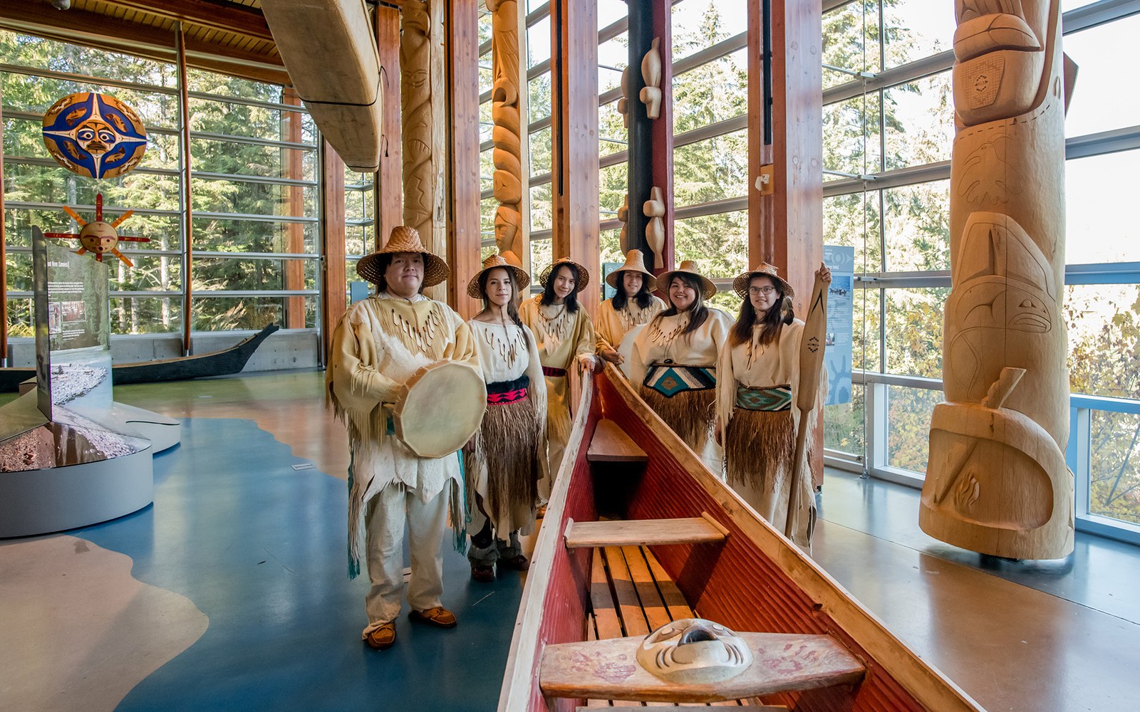 Skwxwu7mesh Lilwat7ul Cultural Centre performers and canoe